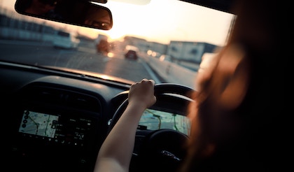 Woman in car: Photo by takahiro taguchi on Unsplash
